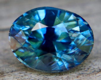 Teal Blue Sapphire: 0.99 Carat Oval Cut Loose Gemstone