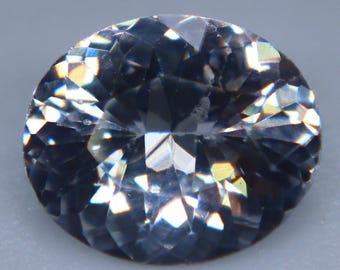 Natural White Sapphire: 0.85 Carat Oval Cut Ceylon Gemstone