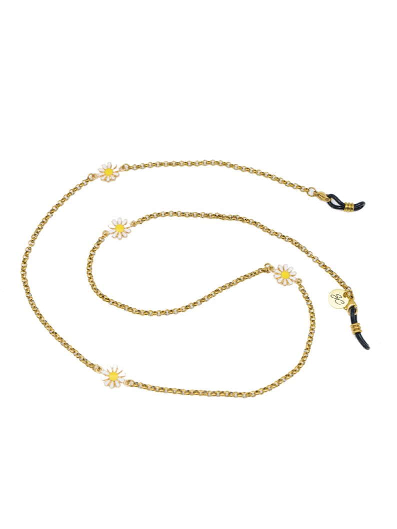 May include: Gold chain with four white and yellow daisy charms. The chain has black rubber ends for attaching to glasses.