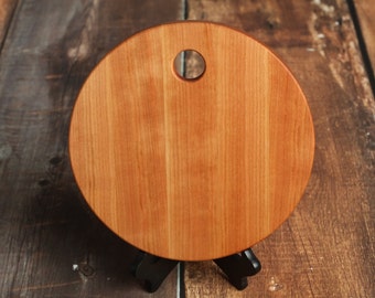 Round Custom Cutting Board Made from Cherry Wood with Hole for Hanging - Handmade and Can be Personalized