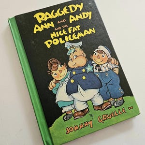 Raggedy Ann y Andy y el simpático policía gordo, Johnny Gruelle, Bobbs Merrill Company, edición de 1960, BUEN estado, libro infantil vintage