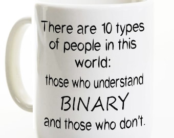 May include: White ceramic mug with a curved handle. The mug features black text that reads: "There are 10 types of people in this world: those who understand BINARY and those who don't."