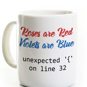 May include: White ceramic mug with a handle. The mug features the text "Roses are Red, Violets are Blue, unexpected '{' on line 32" in red, blue, and black font. The mug is a standard size.