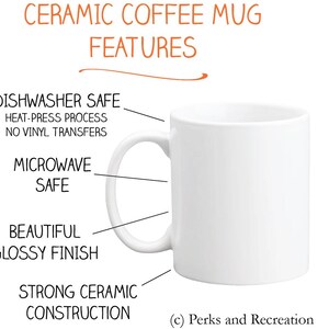 May include: White ceramic coffee mug with a glossy finish. The mug is dishwasher and microwave safe. It is made with a strong ceramic construction and features a heat-press process with no vinyl transfers. The text "(c) Perks and Recreation" is printed on the bottom of the mug.