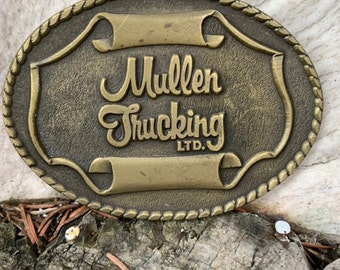 Vintage Muller Trucking belt buckle
