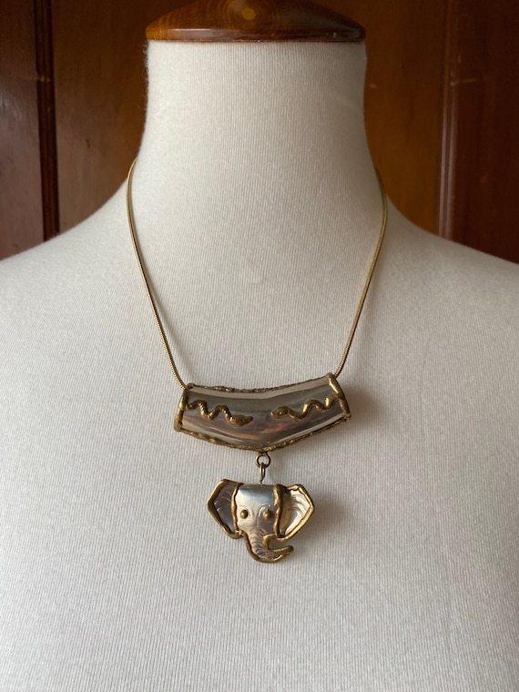 Gold Necklace with Elephant Head Pendant - image 1
