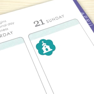 May include: A teal blue sticker with a white church icon on a calendar page for Sunday, April 21st.