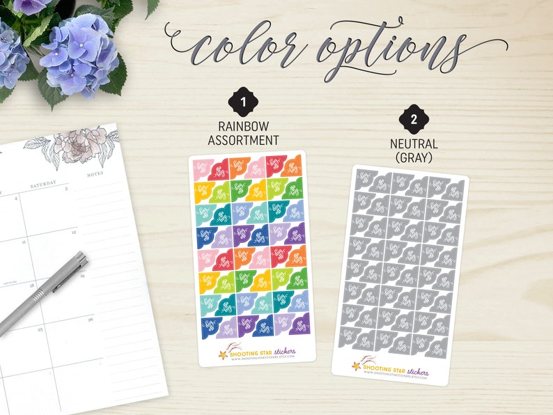 May include: Two sticker sheets with color options: rainbow assortment and neutral gray. The rainbow sheet features colorful flag-shaped stickers. The gray sheet has gray flag-shaped stickers. The text "color options" is at the top.