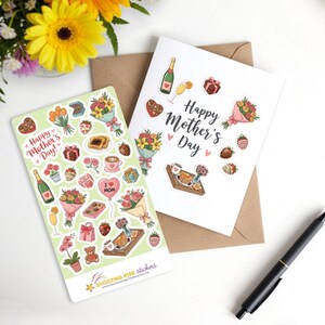 May include: A sheet of stickers with a green background and illustrations of flowers, champagne, chocolate, and other Mother's Day themed items. The text "Happy Mother's Day!" is featured on the sheet. The sheet is next to a white card with the text "Happy Mother's Day" and similar illustrations.