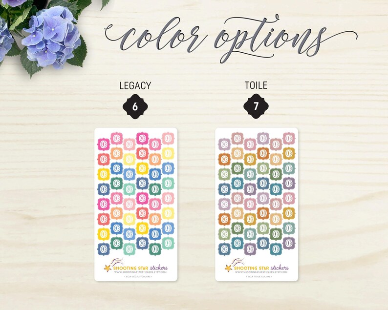 May include: Two sticker sheets with the text "color options". The "LEGACY" sheet has colorful stickers, while the "TOILE" sheet has muted-tone stickers. Each sticker has a decorative border and the number "0" in the center.