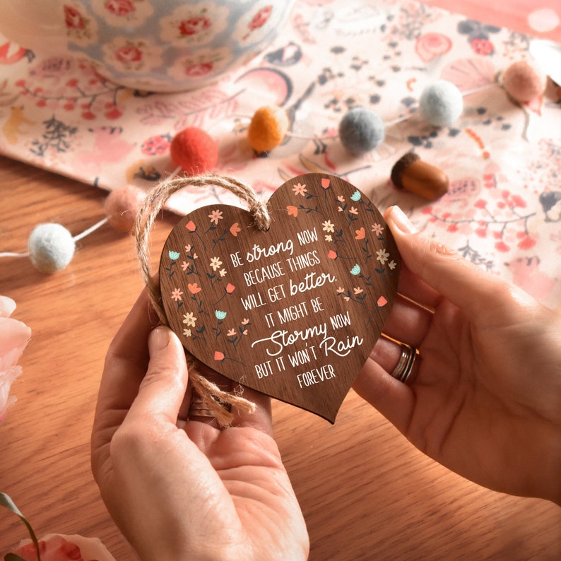 a decoration ornament made from wood that has a heart shape prints motivational inspirational message is the best gift for your granddaughter