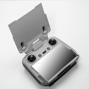 DJI RC Screen shade and scratch protector, Leave sticks in place between flights.