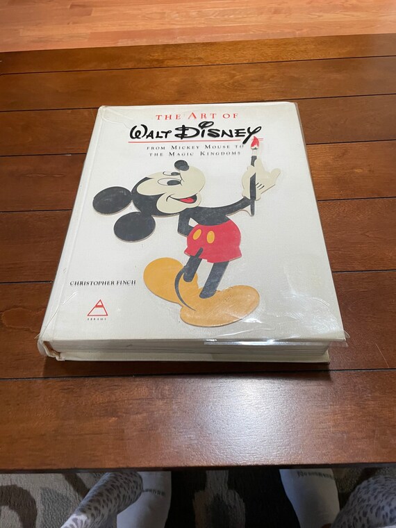 The Art of Walt Disney: from Mickey Mouse to the Magic Kingdoms and Beyond (Disney 100 Celebration Edition) [Book]