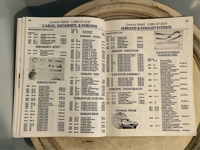 May include: A catalog page for Corvette World, featuring a variety of car parts and accessories, including cables, grommets, emblems, and exhaust systems. The page includes part numbers, descriptions, and prices for each item. The image also includes a small illustration of a Corvette.