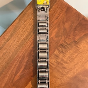 May include: A Craftsman 9-piece 6PT 3/8 inch drive socket set in a gray plastic storage rail. The packaging includes the text 134441, 6PT 3/8 inch Drive Socket Accessory Set, 9 pieces, and the Craftsman logo. The sockets are silver-colored metal.
