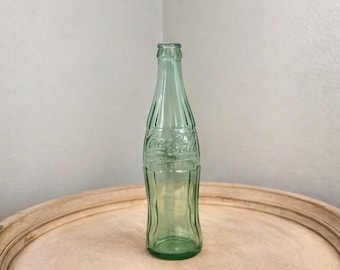 Vintage 12 oz Green Coca-Cola Glass Bottle, Classic Contour Design, Collectible Soda Memorabilia
