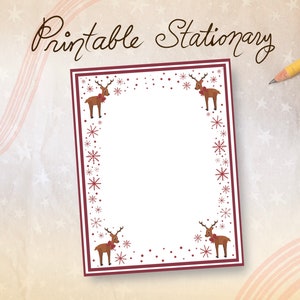May include: Printable stationery with a festive design. The white paper is framed with a burgundy border and adorned with reindeer and snowflake illustrations. The words "Printable Stationery" are written in a decorative font. A yellow pencil rests on the background.