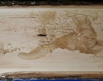 Winter's  Red Beauty, by Tami Elise, laser engraved on wooden plank.