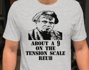 Acerca de Reub, un 9 en la escala de tensión - Camiseta unisex