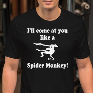 May include: A black t-shirt with a white graphic of a spider monkey and the text "I'll come at you like a Spider Monkey!"