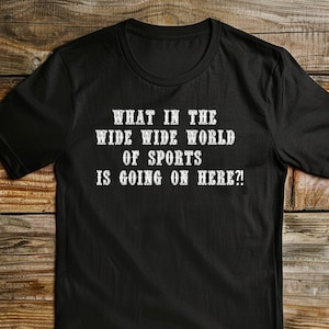 What In The Wide Wide World Of Sports Is Going On Here? Unisex T-Shirt