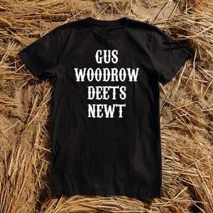 Camiseta unisex de Gus Woodrow con detalles de Newt