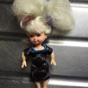 Vintage small Doll