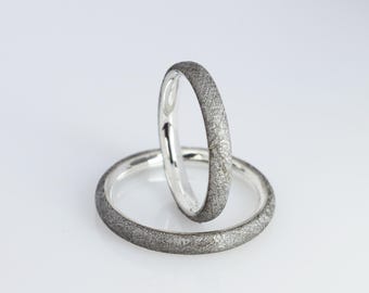 Round meteorite and silver partner rings