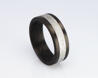 Carbon ring with meteorite