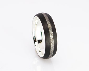 Carbon ring with meteorite insert