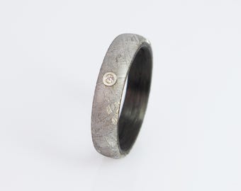 Carbon ring with meteorite and diamond