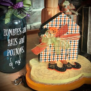 wicked witch of the east, yellow brick road, witches legs, tiered tray decor, Halloween house