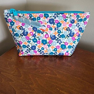 Cosmetic pouch, essentials bag, travel. Fabric by Posey Morning from Trouvaille.