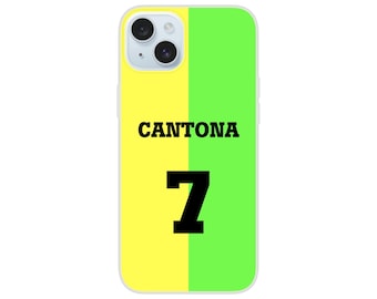 May include: A phone case with a yellow and green vertical split design. The word "CANTONA" is printed in black, above the number "7" in black. The phone case has a camera and flash.