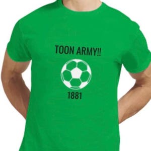 May include: A green t-shirt featuring the text "TOON ARMY!!", a white and black football graphic, and the number "1881". The shirt is a solid green colour.