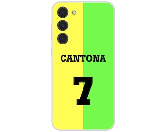 May include: A phone case with a yellow and green vertical split design. The word "CANTONA" is printed in black, above the number "7" in black. The phone case has a camera module with three lenses.