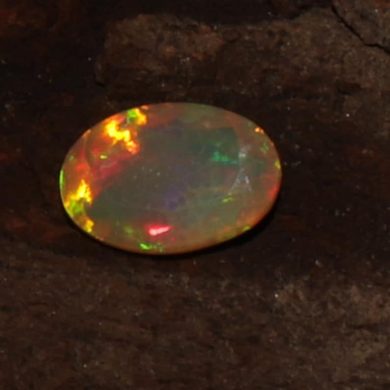 1.50 TCW 7x11mm Genuine Ethiopian Welo fire Opal Faceted Opal cut stone Opal stone Oval Opal for jewelry Opal opal collection