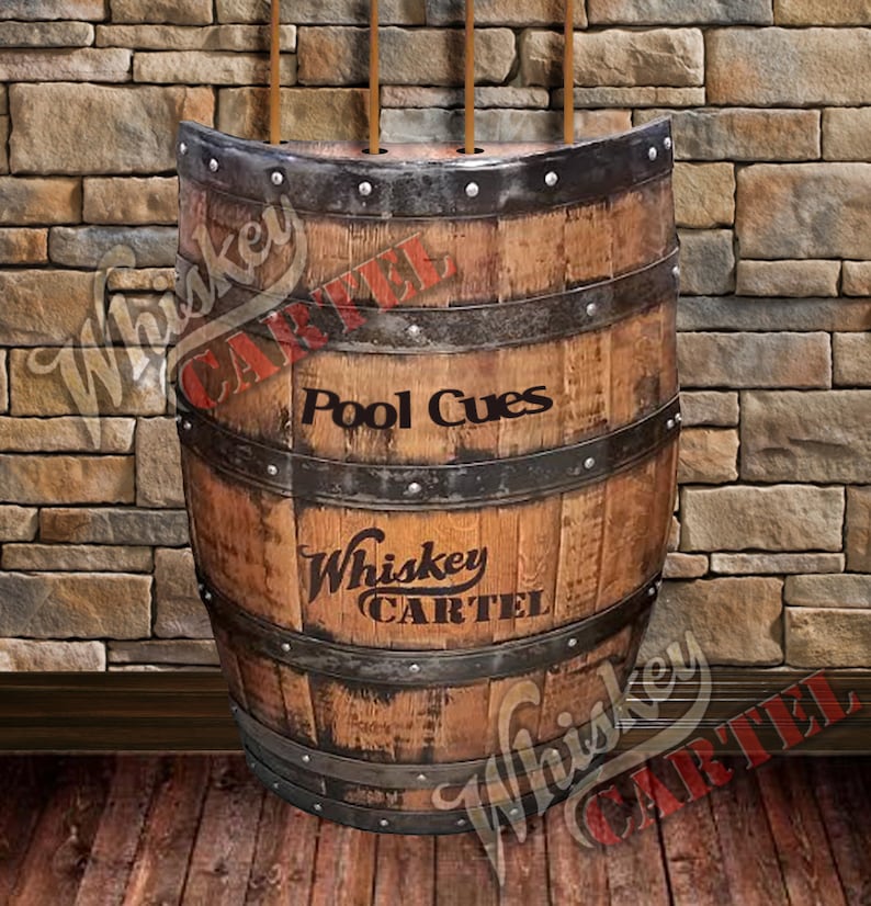 May include: A wooden barrel with metal bands and a sign that says "Whiskey Cartel" and "Pool Cues".