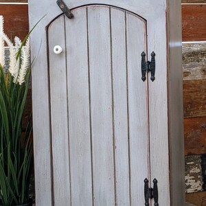 Arched Door Cabinet, Wall Hanging Cabinet, Medicine Chest, Spice Cabinet. Size: 15" w x 23 3/4" t x 6 1/2" d. I.D. 4"