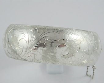 Sterling Silver 1" Wide Bangle Bracelet With An Etched Floral Design