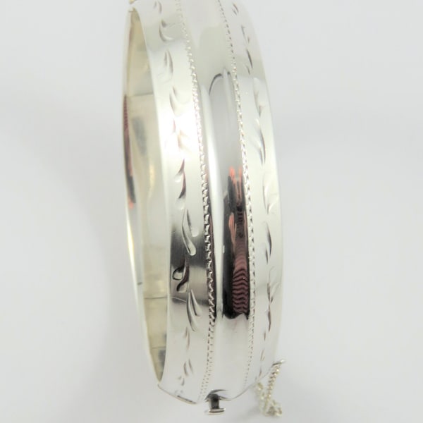 Sterling Silver 5/8" Wide Bangle Bracelet With An Etched Design