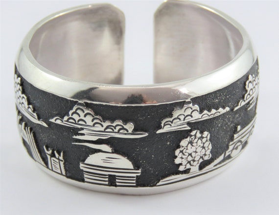 Sold Original Tommy Singer Engraved Sterling Silver - Navajo