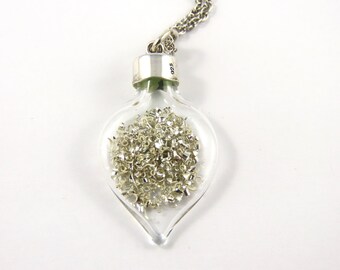 Sterling Silver  Heart Shaped Pendant With An 18" Light Rope Chain