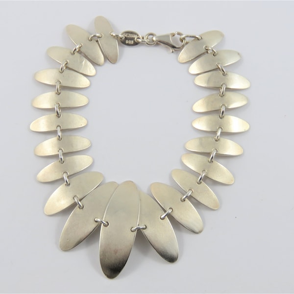 Sterling Silver 7" Sezgin Bracelet With Graduated Long Oval Discs