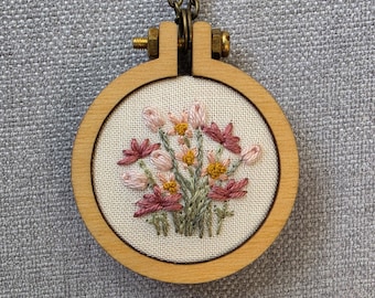 Embroidery hoop necklace. Pink flower pendant. Flower Embroidery Wearable Textile Art.