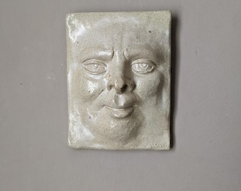 Céramique artisanale sculpture murale curiosité