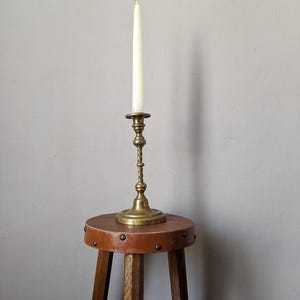 Antique brass candle holder