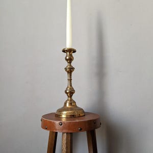 Antique brass candle holder