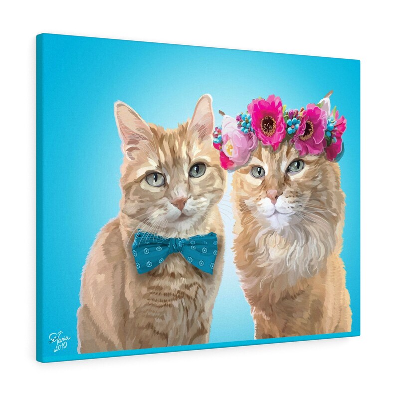 May include: A canvas print featuring two orange tabby cats against a light blue background. One cat wears a blue bow tie, and the other wears a floral crown of pink and white flowers. The artwork is signed "Faria 2019".