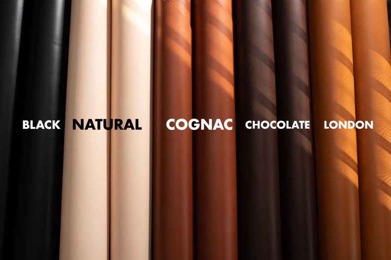 Puede incluir: Primer plano de ocho muestras de cuero en diferentes colores, incluyendo negro, natural, co&ntilde;ac, chocolate y Londres. Las muestras est&aacute;n dispuestas una al lado de la otra y muestran los diferentes tonos y texturas del cuero.